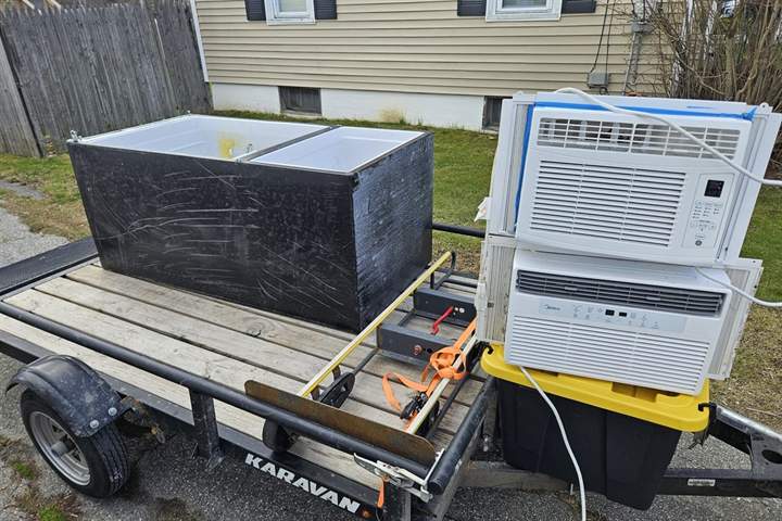 Appliances secured on a utility trailer